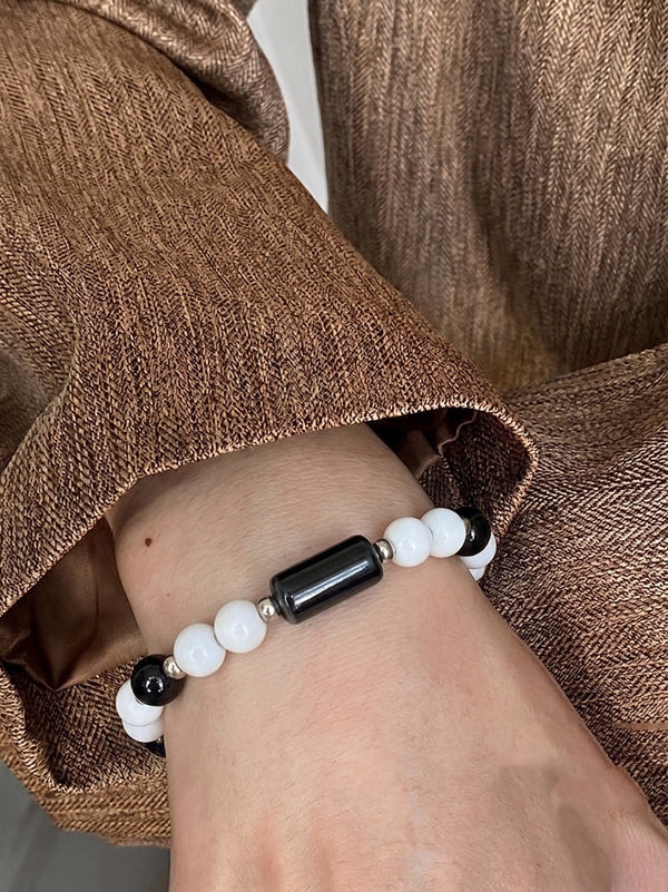 The Tuxedo Twist Ceramic Barrel Charm