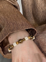 The Tiger's Glint Ceramic Cube Charm