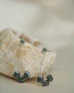 The Floating Emerald Dewdrops