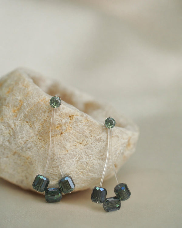 The Floating Emerald Dewdrops