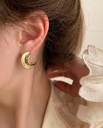 The Golden Eclipse Croissant Studs