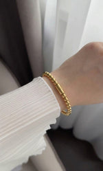 The Golden Dewdrop Bead Bracelet